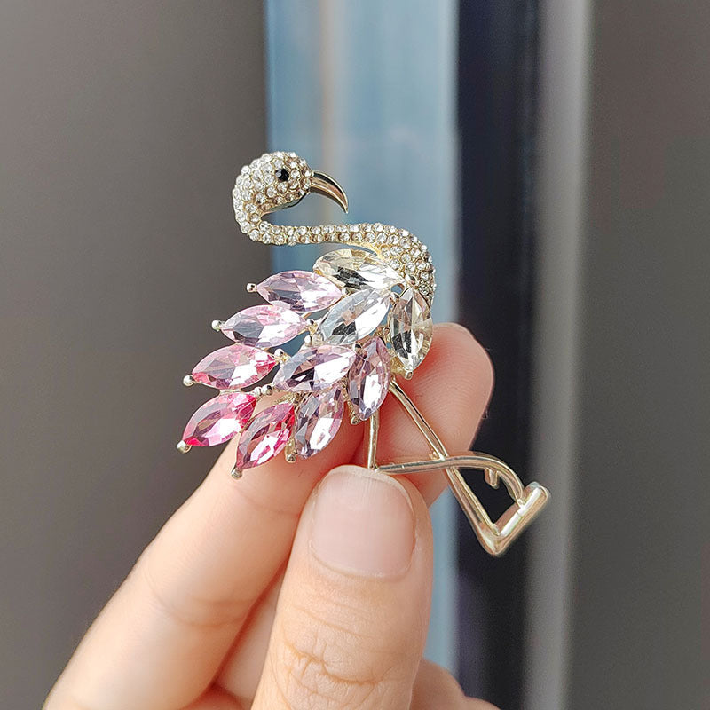 Flamingo Brooch against formal suit fabric
