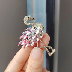 Flamingo Brooch against formal suit fabric