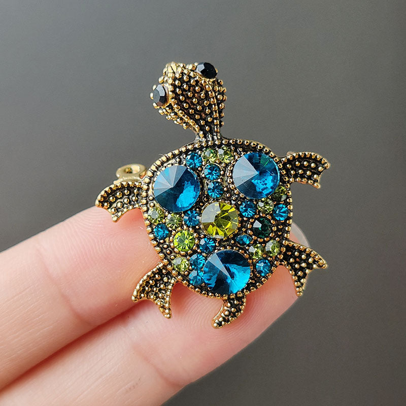 Charming turtle design brooch on display