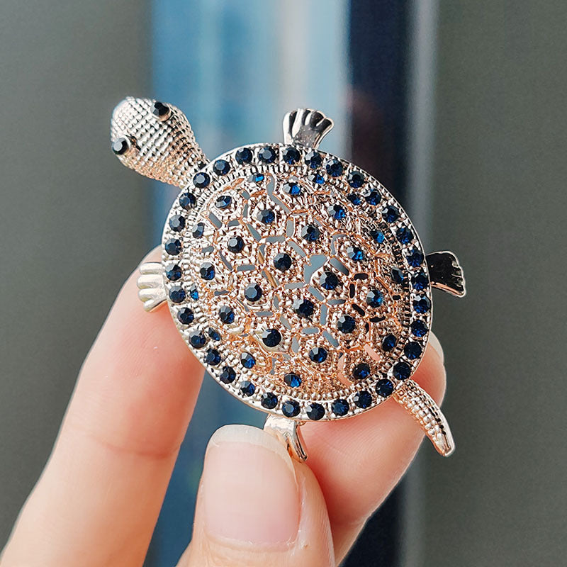 Charming turtle design brooch on display
