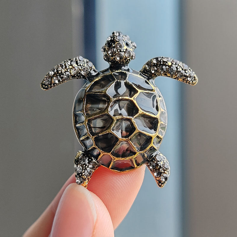 Colourful turtle brooch with shiny finish