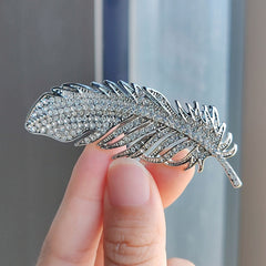 full view of the brooch on a dress for occasions