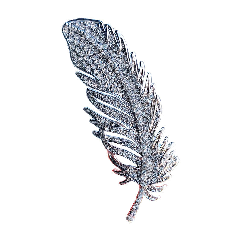 feather designer pin highlighting fashion appeal