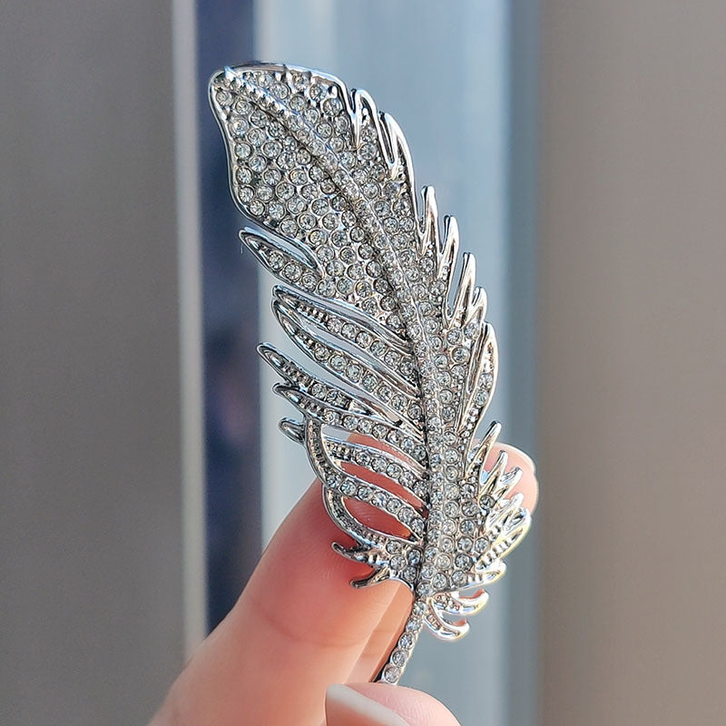 showcasing the brooch's durability with a stylish look
