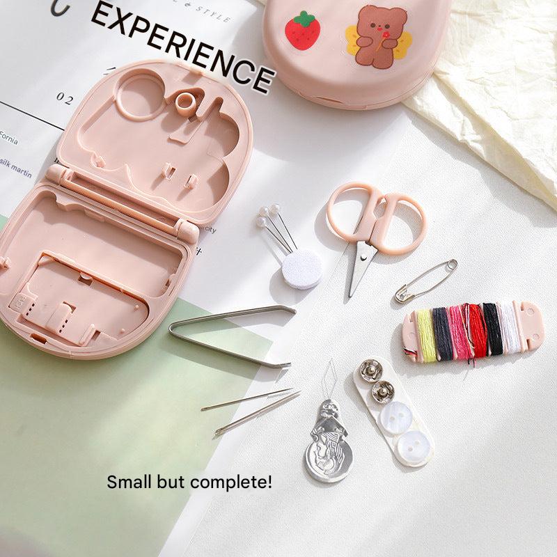 Essential sewing tools in a mini sewing box