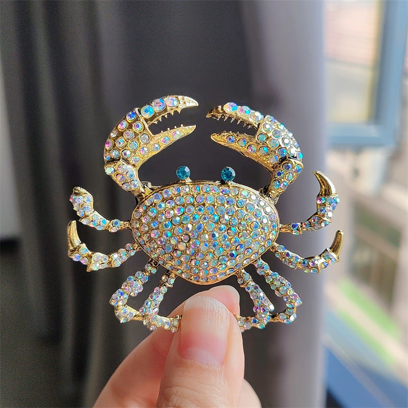 Stylish Alloy Crab Brooch displayed with other accessories
