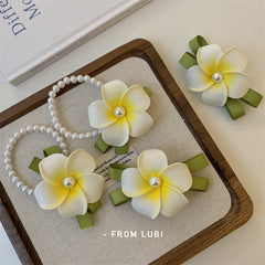 Close-up of dainty floral hair clips