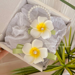 Close-up of dainty floral hair clips
