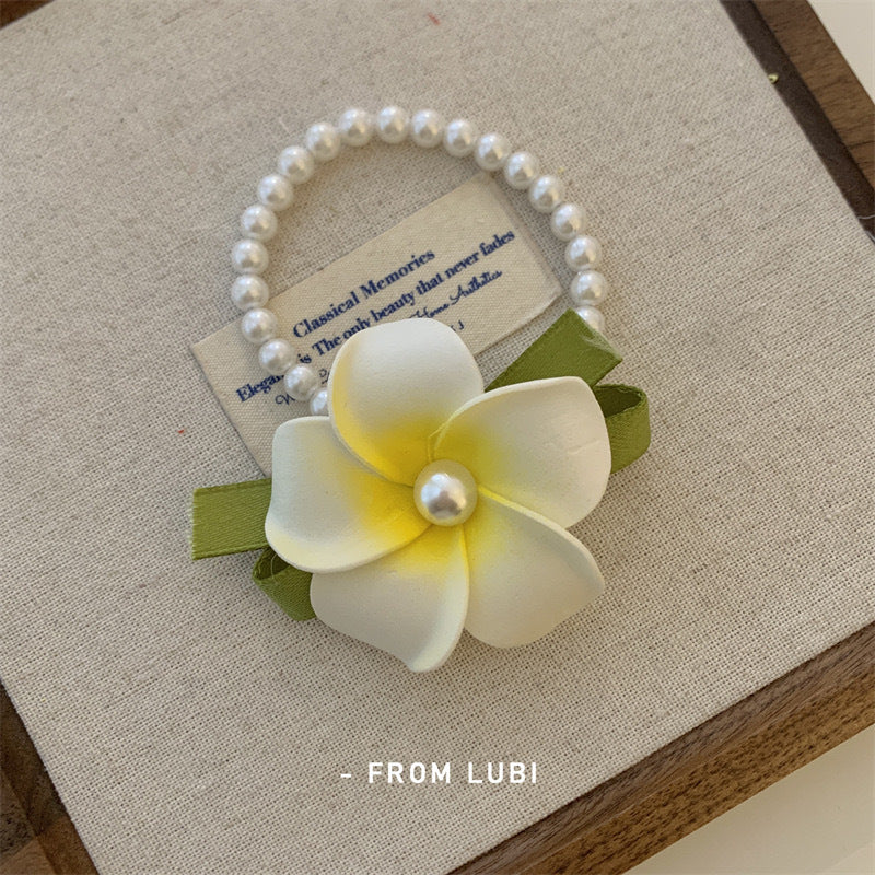 Detailed view of floral hair accessories