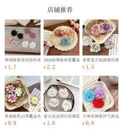Cute floral hair clips on a wooden table