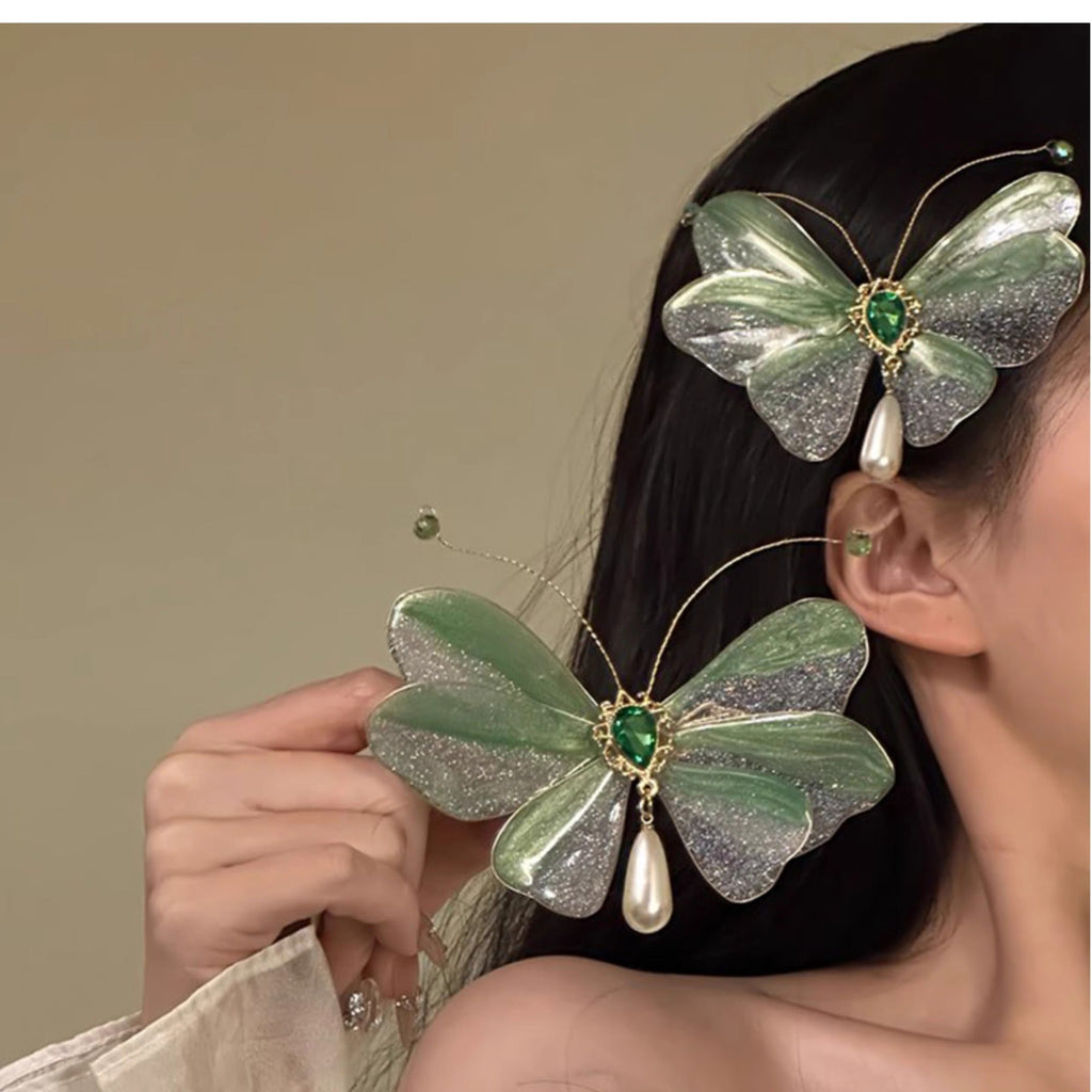 green butterfly hair clip styled in hair