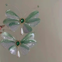sheer butterfly hair accessory showcased